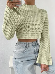 Detailed knit texture of a sage green cropped sweater with stylish flare bell sleeves