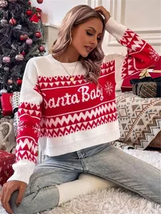 Detailed view of women's red and white festive Christmas knit sweater with Santa Baby text