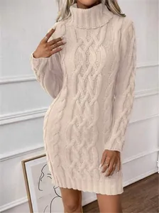 Detailed view of cream cable-knit turtleneck dress featuring a slim-fit texture