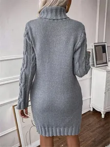 Detailed back view of gray turtleneck cable knit slim sweater dress with long sleeves