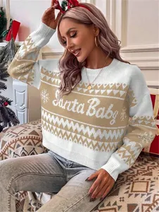 Close-up detail of women's loose beige knit Christmas sweater featuring Santa Baby text design