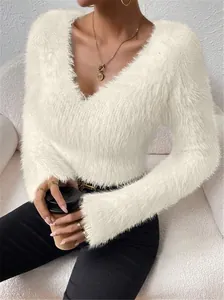 Detailed view of soft white fuzzy shaggy v-neck long sleeve cropped sweater for women.
