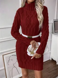 Detail view of the elegant burgundy turtleneck cable knit sweater dress with belt