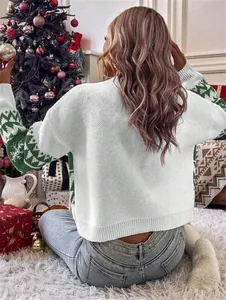 Back view of a festive white knit sweater with green Christmas tree sleeve patterns.