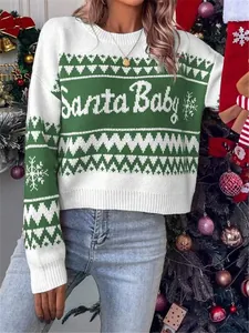 Detailed view of a green and white knit Christmas sweater with "Santa Baby" text pattern.
