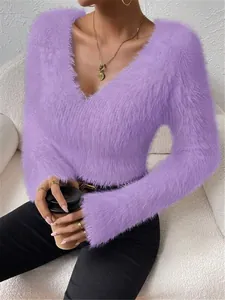 Close-up of purple fuzzy V-neck sweater showing soft mohair-like texture