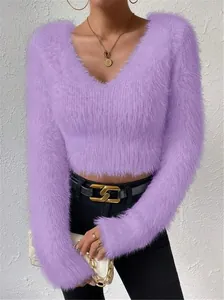Close-up detail of purple shaggy faux fur texture on slim-fit cropped V-neck sweater