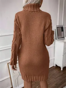 Rear view of a stylish brown turtleneck cable-knit slim fit sweater dress with long sleeves