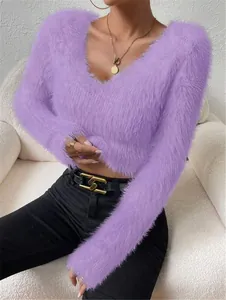 Detailed macro view of a soft purple fuzzy cropped sweater with a deep V-neckline