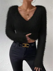 Close-up showing the soft texture of this black fuzzy cropped sweater with V-neck