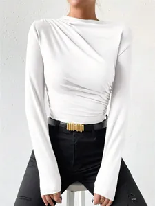 Detail of elegant white long sleeve bodysuit featuring unique ruched draped design