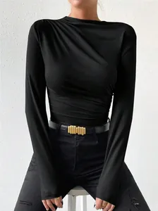 Elegant close-up detail of a black slim-fit ruched long sleeve bodysuit for women