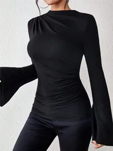 Elegant black slim fit T-shirt detail showing pleated shoulder and stylish flare sleeves