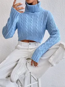 Blue cable-knit cropped turtleneck sweater for women in a stylish casual winter outfit