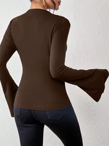 Back view of a brown slim fit long sleeve top featuring stylish flared bell sleeves details