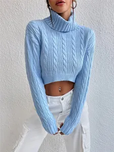 Detailed view of light blue cable-knit cropped turtleneck sweater with long sleeves