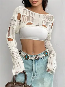Detailed view of a stylish white crochet hollow ripped knit cover-up sweater for women