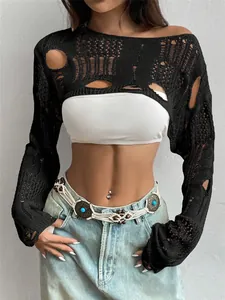 Close-up detail of black distressed crochet knit shrug with a cropped long sleeve design