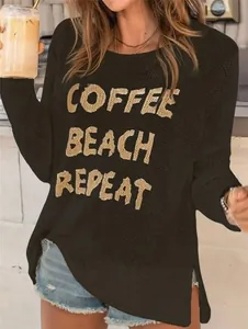 Detail view of black knit sweater featuring Coffee Beach Repeat sequined lettering.