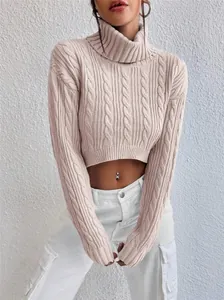 Detailed view of women's turtleneck cable knit cropped sweater in beige color