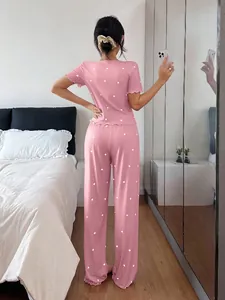 Back view of pink heart-patterned ribbed short-sleeve pajama set with long leisure pants