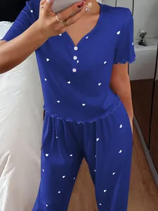 Detail of blue ribbed heart print pajama set with short sleeves and long pants