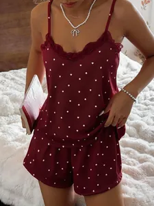 Close-up of burgundy heart print ribbed pajama set with elegant lace trim and heart pattern