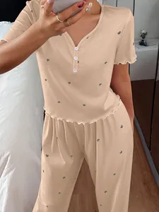 Detailed view of women's apricot heart print ribbed short sleeve pajama set loungewear
