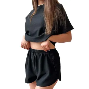 Women's casual black ribbed loungewear set with crew neck tee and elastic waist shorts