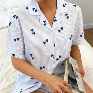 Blue striped short sleeve pajama set for women featuring a cute navy heart print design