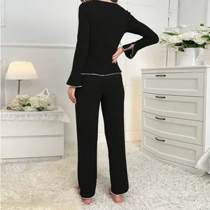 Schwarzes geripptes Pyjama-Set für Damen mit langen Ärmeln und Wellenkanten Rückansicht