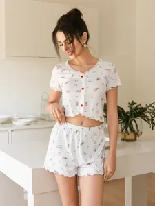 Elegant floral two-piece pajama set with short sleeves and buttons for women