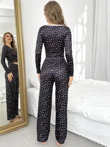 Rear view detail of women's slim-fit floral print pajama set featuring elegant lace trim