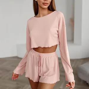 Women's soft pink ribbed long sleeve crop top and drawstring shorts loungewear set