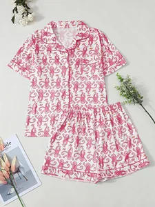 Detaillierte Nahaufnahme des Damen-Schlafanzug-Sets mit rosa Affen-Cartoon-Print