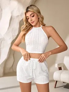 Close-up of white eyelet halter top and shorts set for comfortable loungewear
