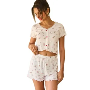 Two-piece floral pajama set for women with short sleeve button-up top and shorts