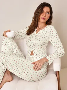 Detail view of floral print long-sleeve pajama set with V-neck cardigan and ruffles