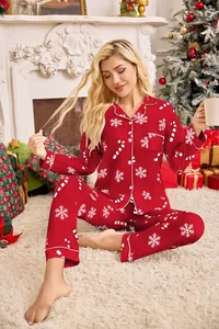 Cozy women's Christmas pajama set with festive red snowflake and candy cane prints