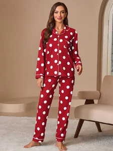 Women's red polka dot pajamas set with long sleeve lapel cardigan for home comfort.
