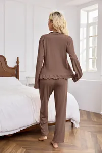 Back view of comfortable brown ribbed long-sleeved pajama set for women in bedroom