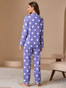 Detailed back view of women's purple and white polka dot pajama set with long pants