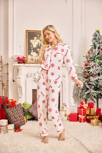 Christmas pajama set for women featuring snowflake and candy cane holiday prints.