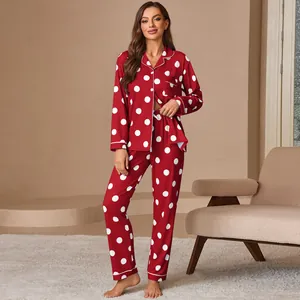 Stylish women's red and white polka dot pajama set with long sleeves and lapel collar