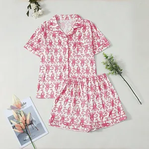 Zweiteiliger Damen-Pyjama mit rosa Affenprint, kurzärmeliges Hemd und passende Shorts