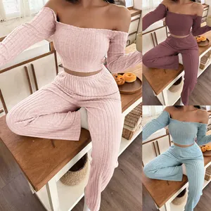 Elegant off-shoulder ribbed knit loungewear set featuring crop top and wide-leg pants