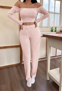 Detail view of a pink ribbed off-the-shoulder long-sleeve loungewear set for women