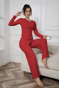 Elegant women's red ribbed two-piece pajama set with long sleeves and wide leg pants