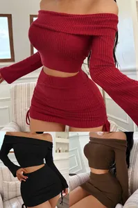 Detail view of stylish off-the-shoulder long sleeve knit crop top and mini skirt set