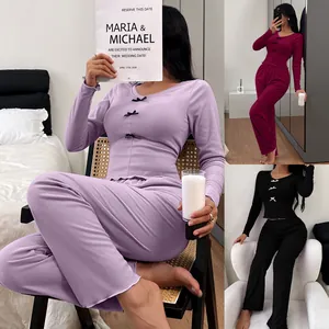 Detailed view of women's slim fit loungewear set with elegant bow details and soft fabric